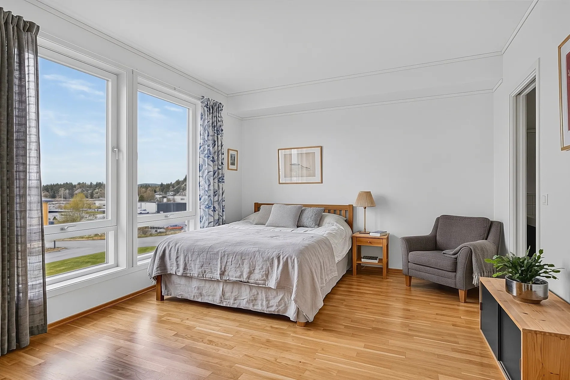 Living room window before and after an AI window pull showing the outdoor view