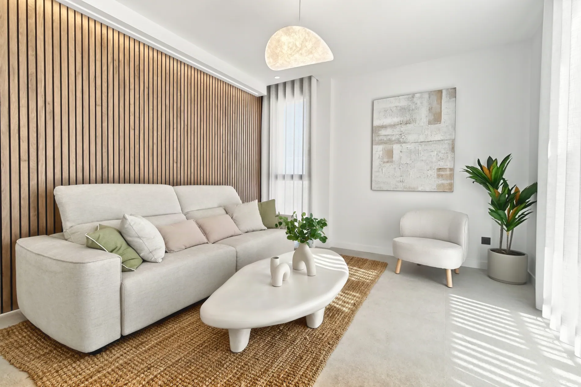 Modern living room before and after AI HDR editing by Stager AI