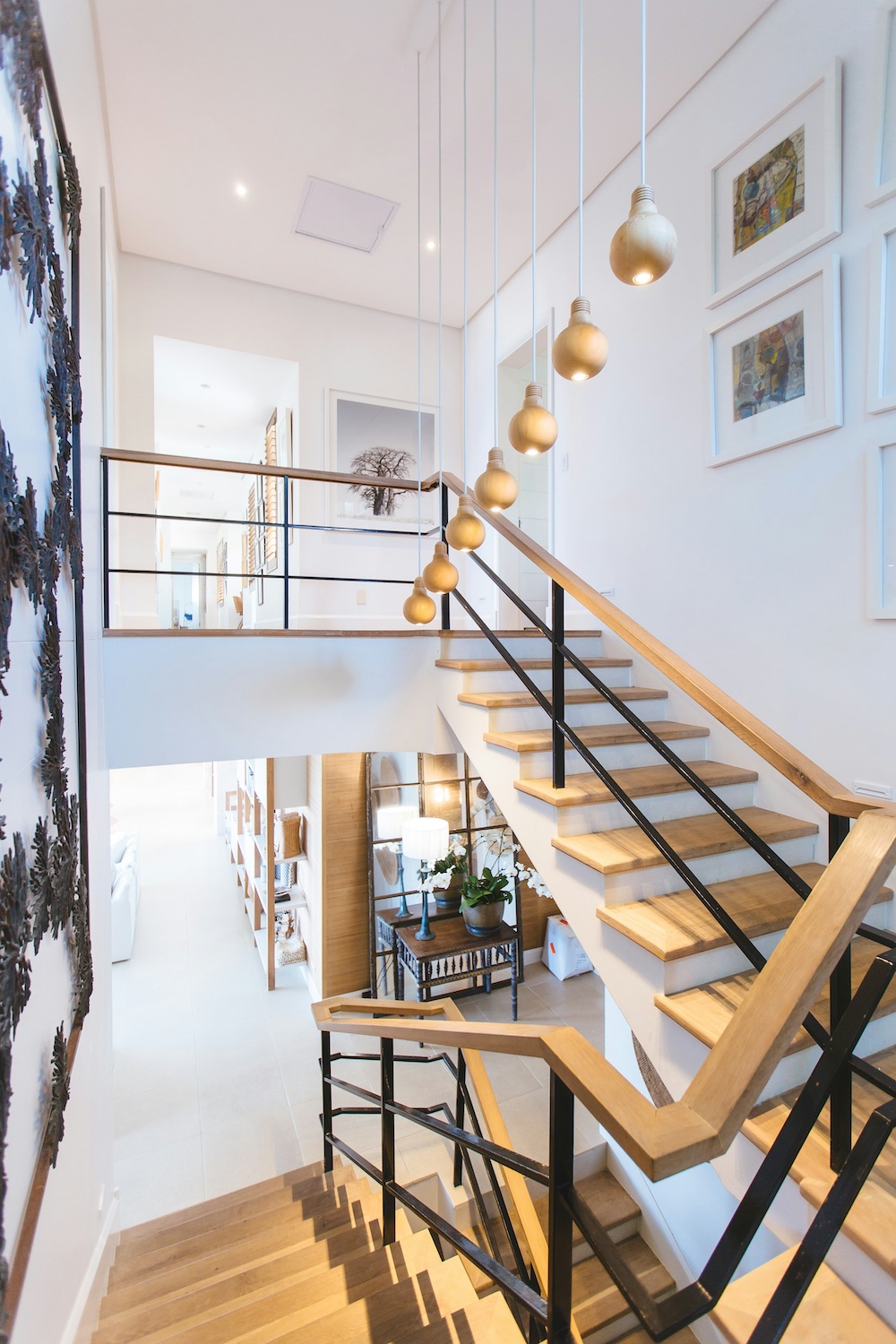 High-contrast interior staircase showing the bright-versus-dark dynamic range challenge