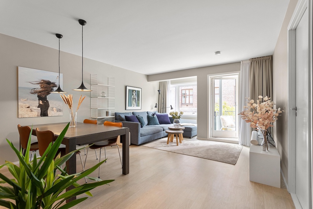 Living room virtual staging — Stager AI vs REimagineHome