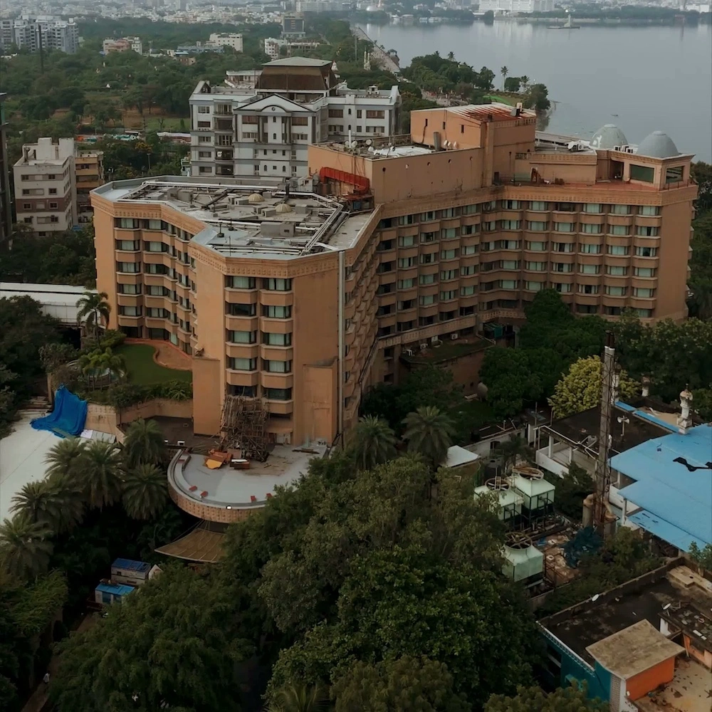 Aerial property walkthrough video — Stager AI vs roOomy